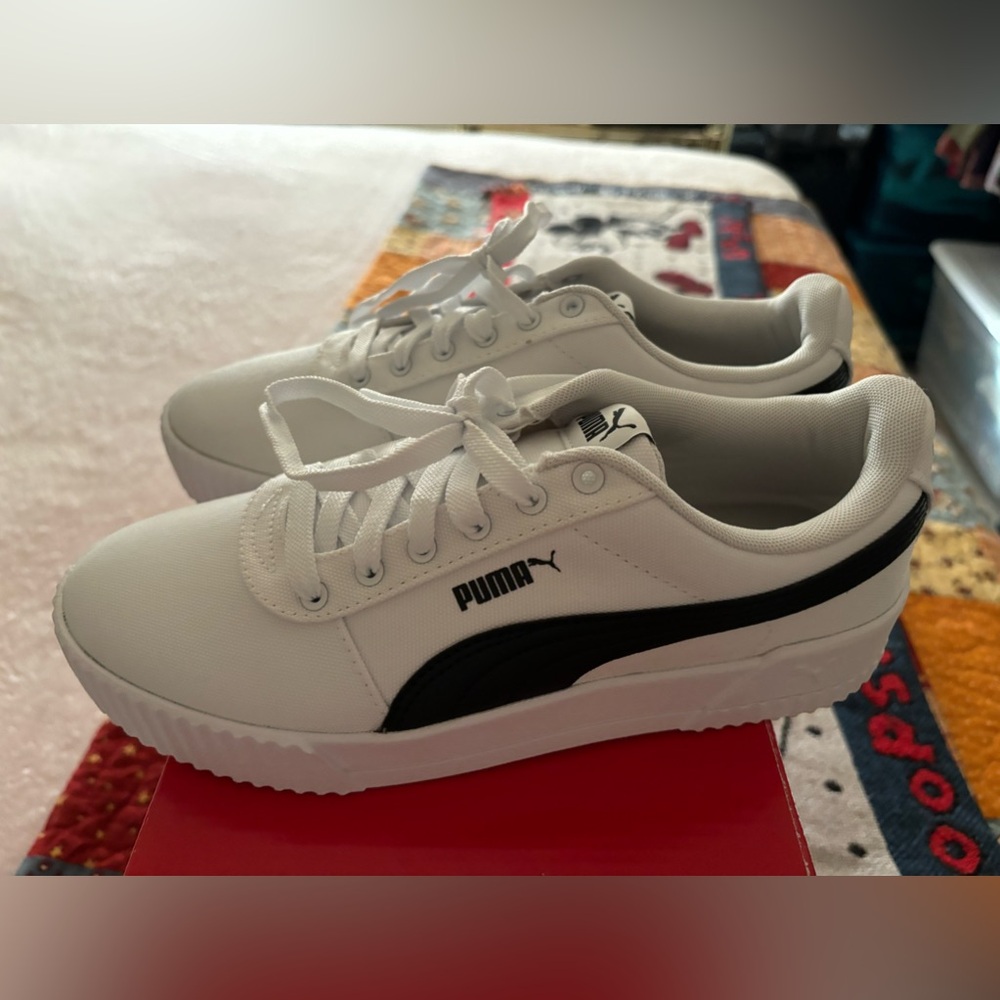 Brand New Never Worn Canvas White/Black with Box Ladies Puma shoe size (9).